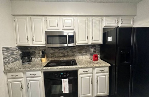 Northeast Carrollton Casa | Extended Stay: Backyard, Garage, Fireplace