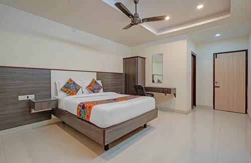 Hennur Gardens Hotel | Fabhotel Sapthagiri Suites Inn