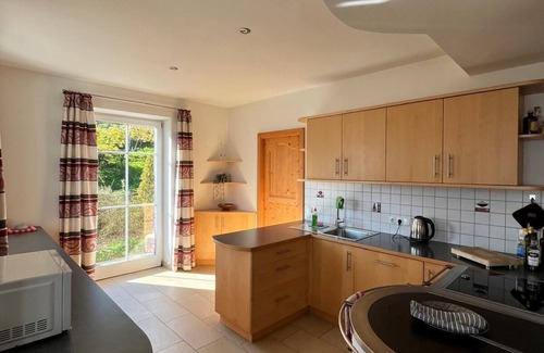 Kurtatsch an der Weinstraße Casa | Family apartment with playground and terrace surrounded by vineyards