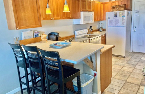 Ono Island Condominio | Condominio de Riverside amigable para familias y tranquilo con piscina, muelles para botes y muelle de pesca