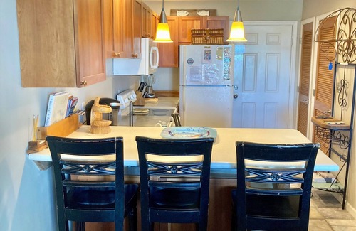 Ono Island Condominio | Condominio de Riverside amigable para familias y tranquilo con piscina, muelles para botes y muelle de pesca