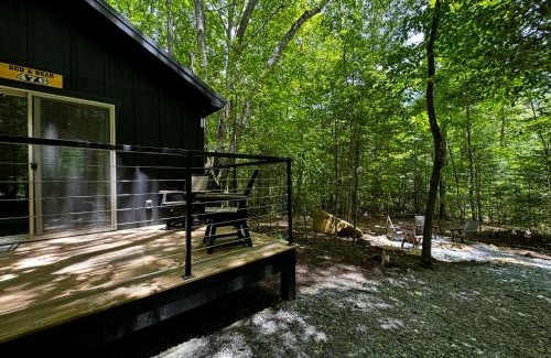 Balsam Grove Otro | Family Glamping Cabin-Bed and Bear at Valley Bear Farms Resort