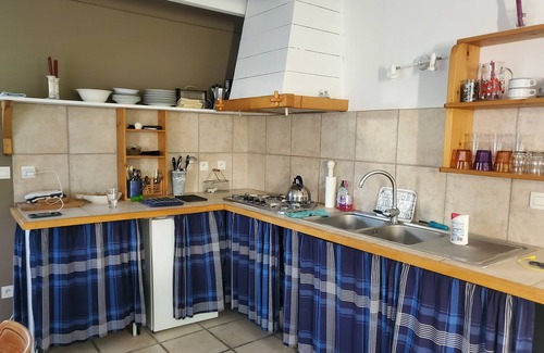 Locmaria Casa | Family home with wooded garden 1km from the beach sleeps 10
