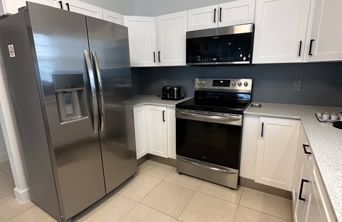 Colliers Bay Condominio | FAMILY SIZE CONDO VIEWS OF CARIBBEAN,MANY AMENITIES, FREE WIFI, NO RESORT FEES