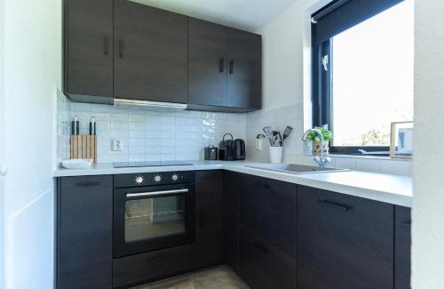 Ewijk Villa | Family Villa With Garden & Lake Access