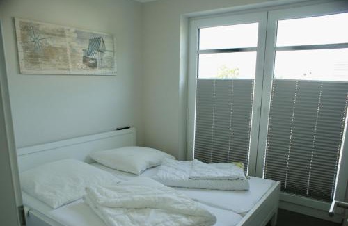 Fehmarnsund Apartamento | Fehmarn-OstseeferienStrandresidenz Vogelflug 14312