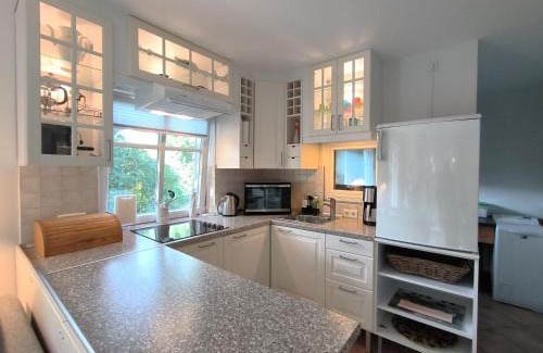 Tarp Casa | Ferienhaus Inger - stilvolles und modernes Ferienhaus mit Terrasse und Gartennutzung