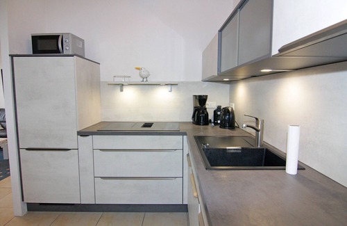 Neuenkirchen Apartamento | Ferienwohnung Seemצwe im Fהhrhaus Vieregge
