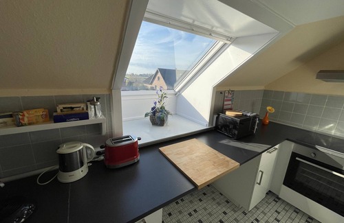 Glueckstadt Apartamento | Apartamento 'Ferienwohnung Mit Balkon' con vistas al lago, jardín compartido y Wi-Fi