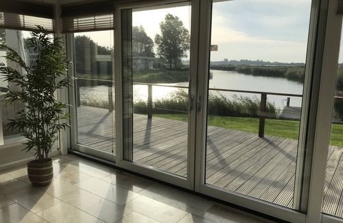 Makkum Casa | FH con una hermosa vista, lanzamiento del bote, hidromasaje al aire libre