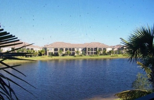 Naples Condominio | Fiddlers 'Creek Varenna Lakeside lujo con Ascensor Privado