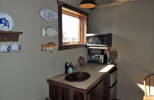 Treloar Cama Y Desayuno | Fish Haus: charming cottage with breathtaking views of the Missouri River!