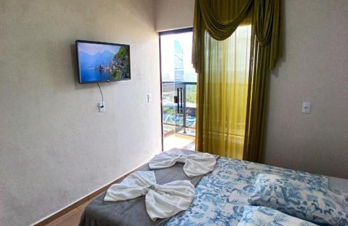 Sao Thome das Letras Apartamento | Flat 02 com Varanda - Avenida Hospedagem
