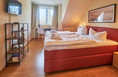 Muritz Apartamento | FLEESENTRAUM Seeadler Grand Maisonette - Für Golfer und Familien - Sauna Kamin Balkon Nintendo - Hunde willkommen!