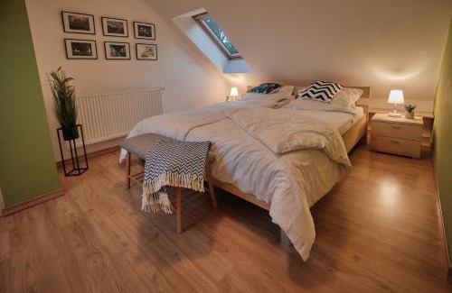 Muritz Apartamento | FLEESENTRAUM Seeadler Grand Maisonette - Für Golfer und Familien - Sauna Kamin Balkon Nintendo - Hunde willkommen!