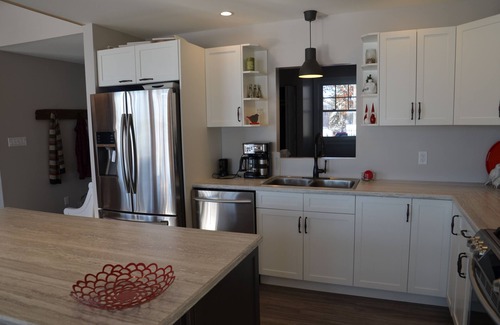 Magnetawan Cabaña | Fox Run: Waterfront Lakehouse con vistas impresionantes y detalles de lujo