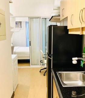 Kapitolyo Apartamento | Free Car Parking - Sheridan North 1BR Apt near BGC