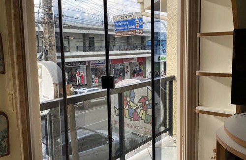 Centro Apartamento | Front-facing apartment with balcony on Garopaba's main street