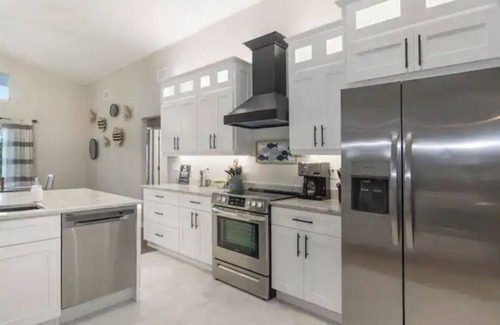 Placid Lakes Casa | Fully updated canal front home with access to Lake June