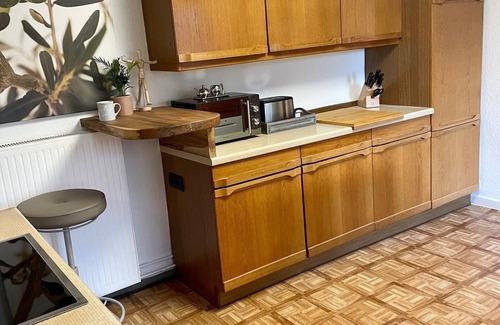 Moers Apartamento | Furnished apartment with garden use and parking space