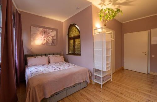 Monsheim Casa | Gästehaus Villa Fliedner - Das Kutscherhaus