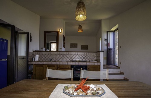 Trinita d'Agultu e Vignola Casa | Gallurese stazzu in the countryside with sea view above Li Feruli