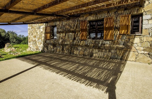 Trinita d'Agultu e Vignola Casa | Gallurese stazzu in the countryside with sea view above Li Feruli