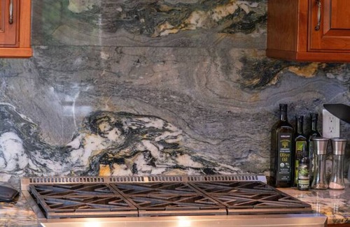 Alta Sierra Villa | Gated Tudor-Style Estate Enormous Chef's Kitchen Hot Tub Lush Landscaping