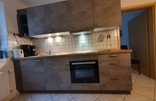 Schwanfeld Apartamento | Gemütliche 60qm Ferienwohnung mit Terrasse, voll ausgestattete Küche