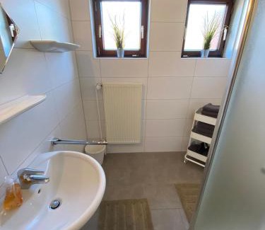 Dietrichsfeld Apartamento | Gemütliche EG-Ferienwohnung Brazil mit eingezäunten Garten