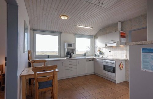 Pellworm Apartamento | Generosamente amueblado apartamento con vistas panorámicas de la isla.