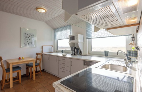 Pellworm Apartamento | Generosamente amueblado apartamento con vistas panorámicas de la isla.