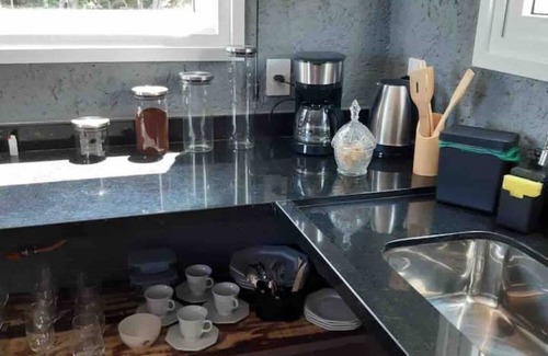 Pantano do Sul Casa | High Standard Glass House - Hosting with Purpose