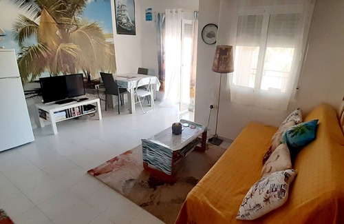 San Miguel de Salinas Apartamento | Apartamento de golf / playa con piscina grande, wifi gratis y TV en inglés