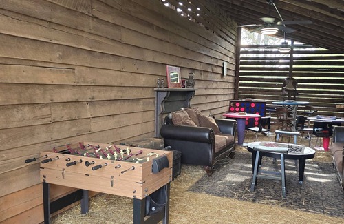 Vein Mountain Otro | Gorgeous farmhouse hot tub fire pit outside bar barn gameroom mountain views