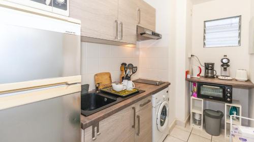 St Gilles-les-Bains Apartamento | Grand T1 avec terrasse à 5min des plages et 400m de St Gilles Les Bains