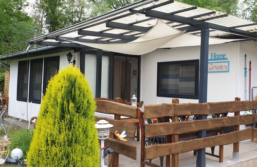 Gotz Casa | Great bungalow on the water (terrace, garden, beach, boat, bicycles, etc.)