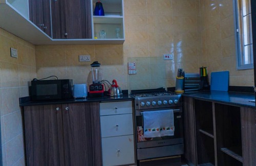 Gwarinpa Estate Hotel | Grey Top Apartment