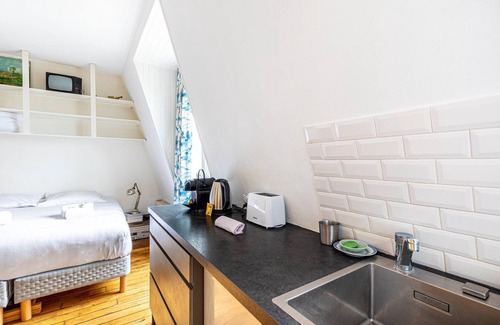 Quartier de la Chapelle Apartamento | GuestReady - Parisian Charm in the Trendy 18th