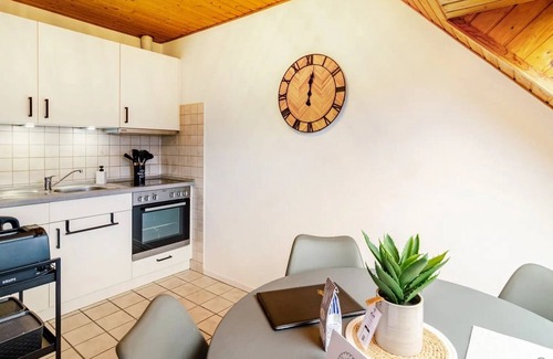 Neßmersiel Apartamento | Hübsche Ferienwohnung in Nessmersiel, mit Balkon, Wlan, Haustiere Gestattet.wallbox