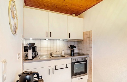 Neßmersiel Apartamento | Hübsche Ferienwohnung in Nessmersiel, mit Balkon, Wlan, Haustiere Gestattet.wallbox