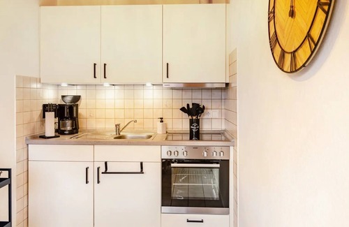 Neßmersiel Apartamento | Hübsche Ferienwohnung in Nessmersiel, mit Balkon, Wlan, Haustiere Gestattet.wallbox