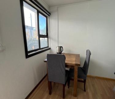 Cochrane Apartamento | Habitación independiente con baño privado