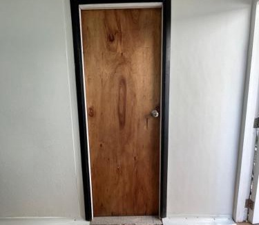 Cochrane Apartamento | Habitación independiente con baño privado