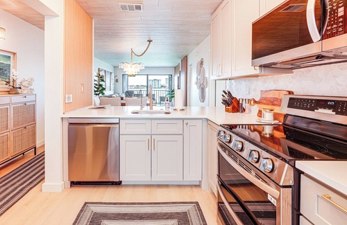 Palma del Mar Condominio | Heated Pool Access: Bayfront Isla Del Sol Condo