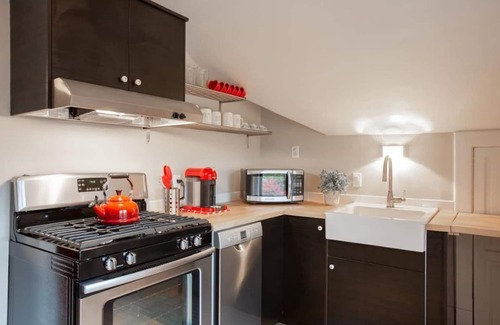 Lowry Hill East Casa | Historic Tudor Meets Modern Decor in Hip Uptown