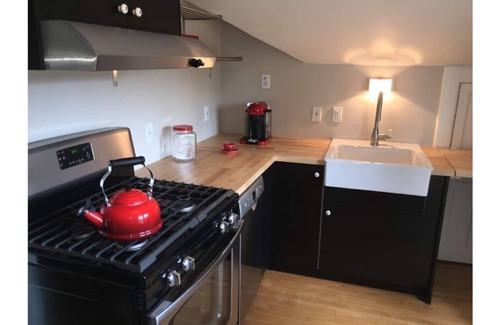 Lowry Hill East Casa | Historic Tudor Meets Modern Decor in Hip Uptown