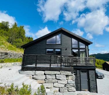 Sogndal Casa | Hodlekvevegen 308 - Flott hytte midt i skisenteret
