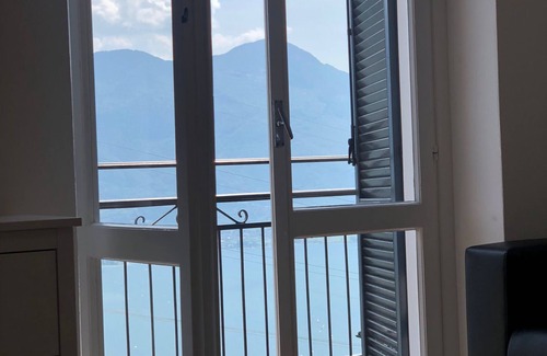 Burano Apartamento | Apartamento vacacional '4' con vistas al lago, piscina comunitaria y Wi-Fi