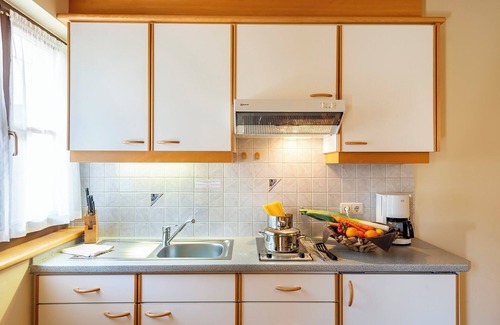 Saltusio Apartamento | Apartamento vacacional "Alpenhof Lodge Hirzer" con vistas a la montaña, piscina comunitaria y Wi-Fi